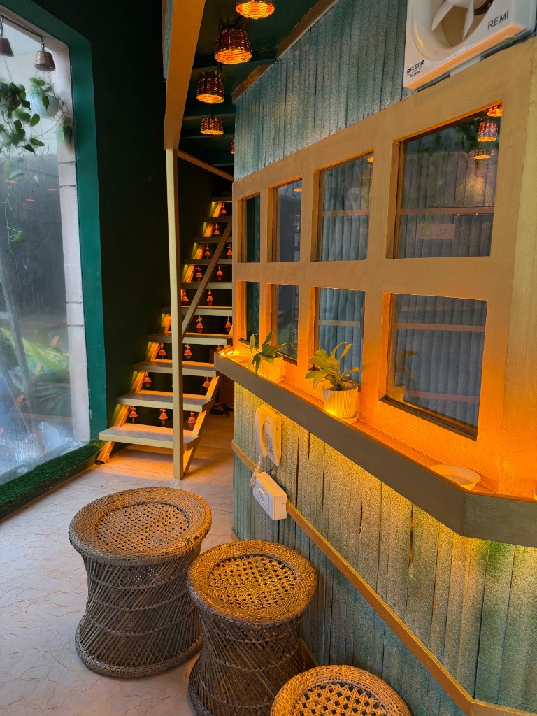 Wicker stools, gold trim and wooden stairs
